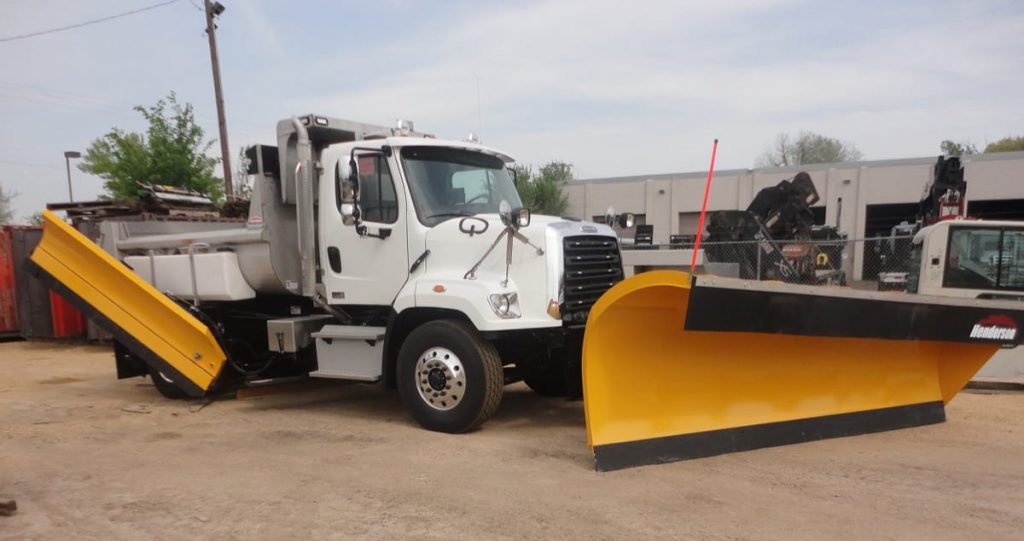 Heavy-duty truck upfit with Henderson dump body and snow plow