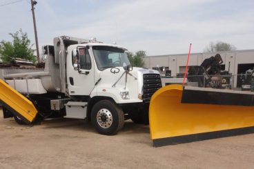 Heavy duty truck upfit with Henderson dump body and snow plows