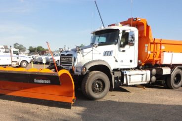 Heavy duty truck upfit with Henderson dump body and snow plows