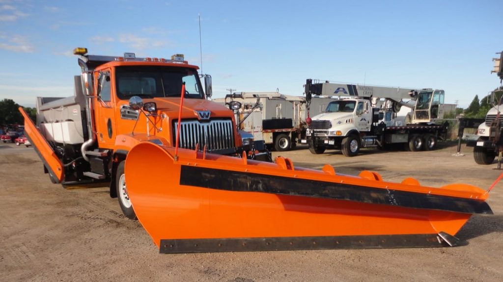 Heavy-duty truck upfit with Henderson dump body and snow plow