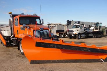 Heavy duty truck upfit with Henderson dump body and snow plows