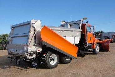 Heavy duty truck upfit with Henderson dump body and snow plows