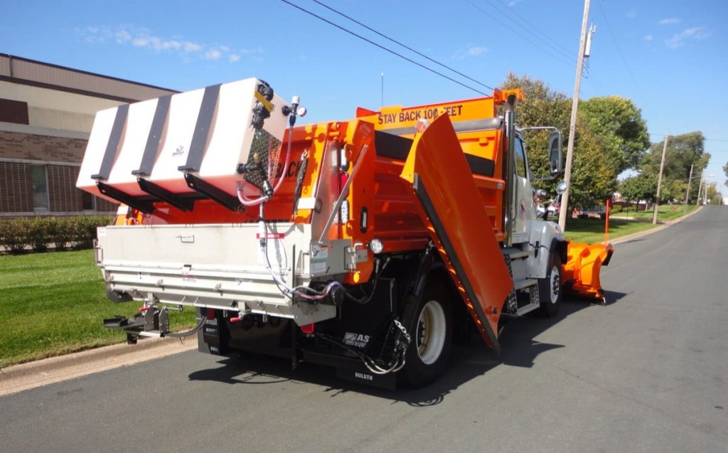 Heavy-duty truck upfit with Henderson dump body and snow plow