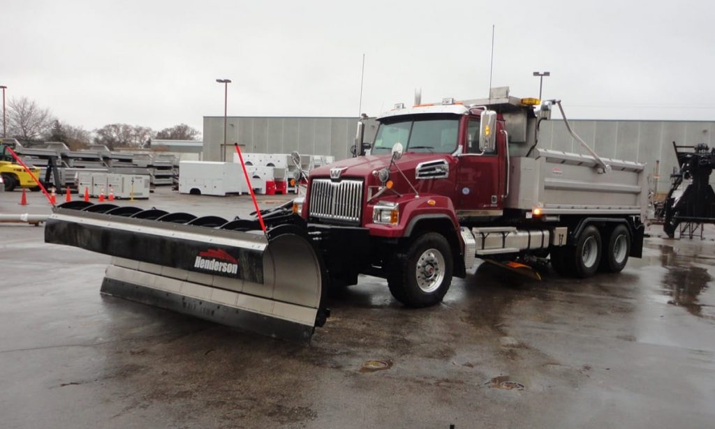 Heavy-duty truck upfit with Henderson dump body and snow plow