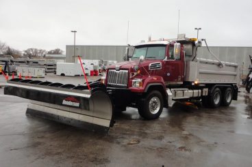 Heavy-duty truck upfit with Henderson dump body and snow plow