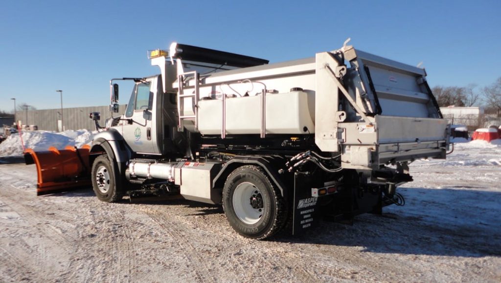 Heavy-duty truck upfit with Henderson dump body and snow plow