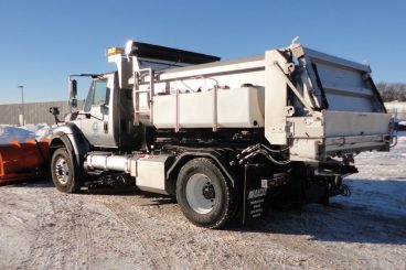 Heavy-duty truck upfit with Henderson dump body and snow plow