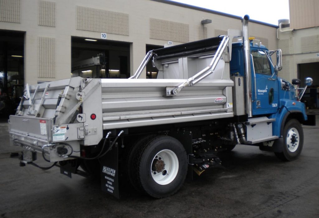 Heavy-duty truck upfit with Henderson dump body and snow plow