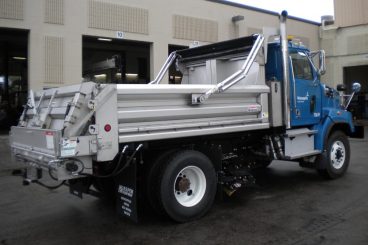 Heavy-duty truck upfit with Henderson dump body