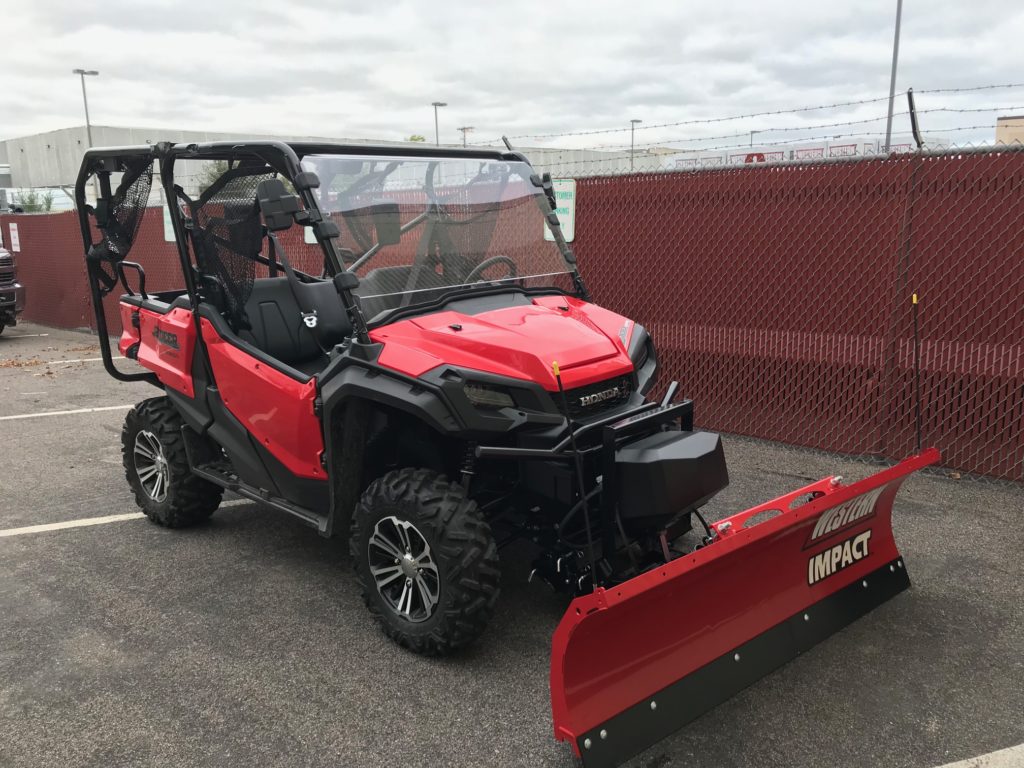 Western Plows pre-wet system hopper spreader pre-wet material into a liquid brine solution