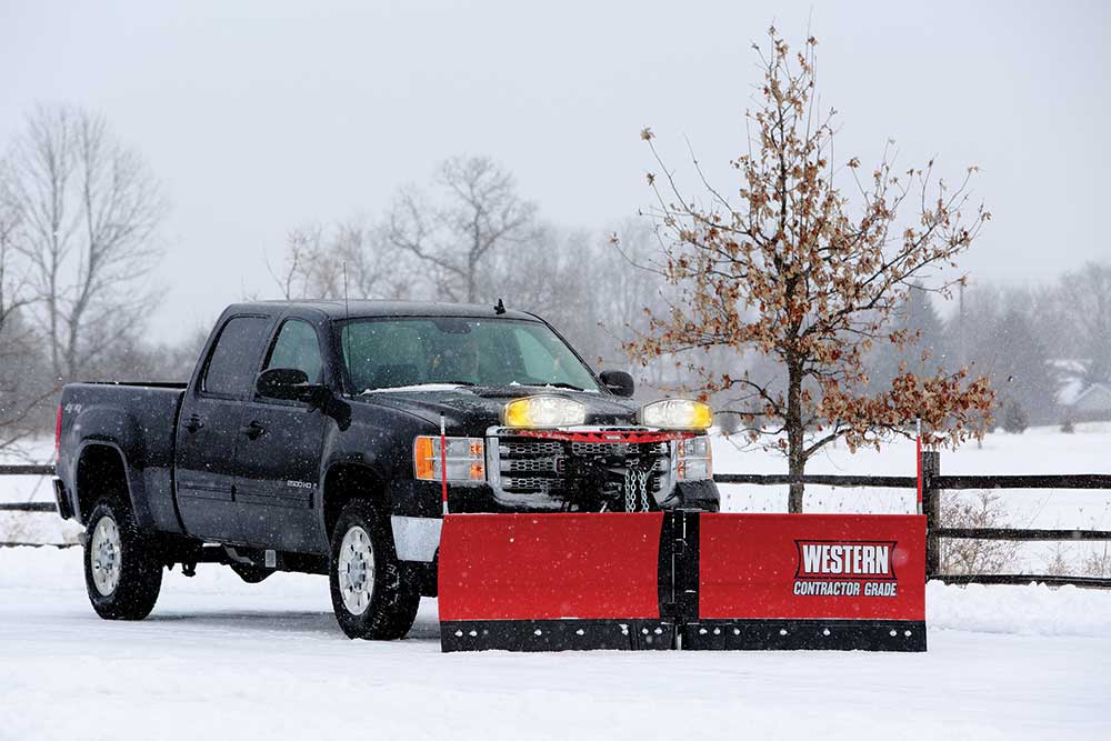 Western Plows pre-wet system hopper spreader pre-wet material into a liquid brine solution