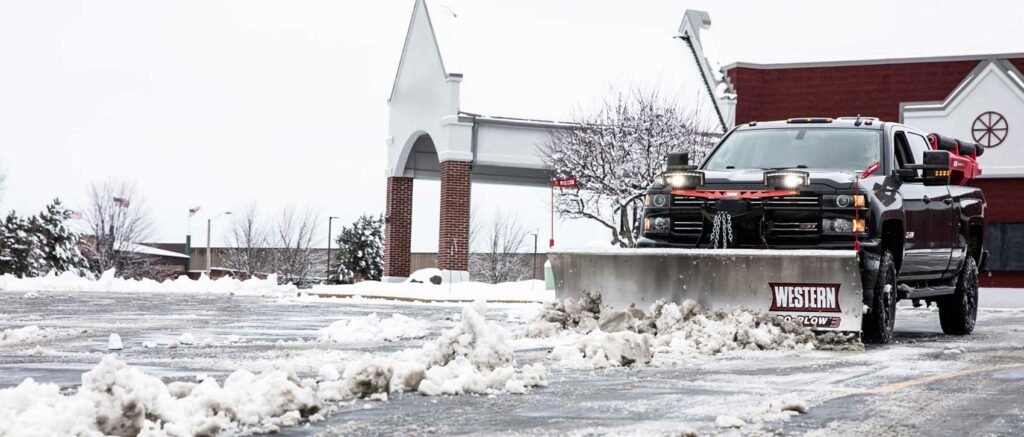 Western Plows pre-wet system hopper spreader pre-wet material into a liquid brine solution