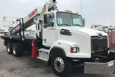 Purpose-built Western Star 4700, Elliott G85, 85 ft working height, 20 ft flatbed with storage