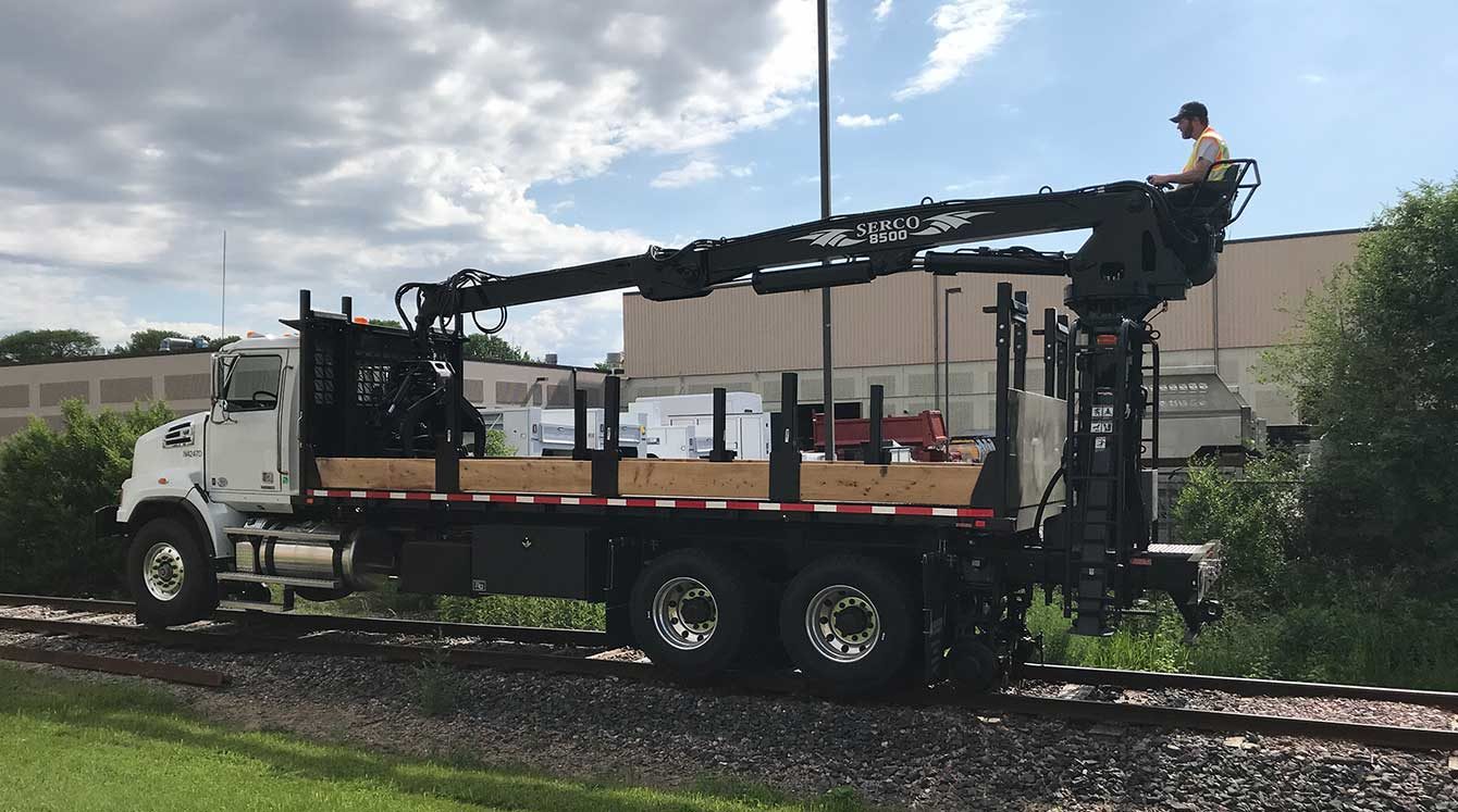 Railroad grapple truck with Aspen Creep Drive