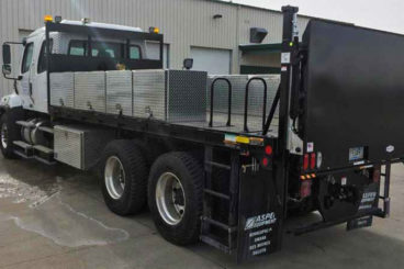 Purpose-built Freightliner 114SD, 20 ft flatbed with storage boxes, 2,000 lbs Tommy Gate lift gate