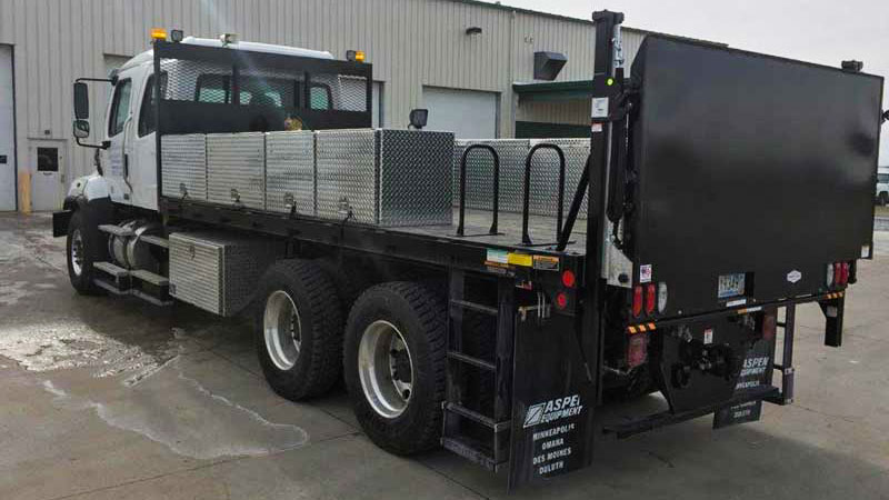 Purpose-built Freightliner 114SD, 20 ft flatbed with storage boxes, 2,000 lbs Tommy Gate lift gate