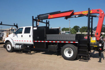 Ford F750, Palfinger PK 9000 19,000 lbs capacity, 18'4 reach, 14 ft section body with storage and railracks, 5/10 GPM hydraulic tool circuit, Harsco Hyrail, strobe and spotlight package