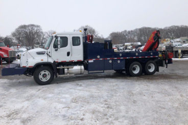 Purpose-built railroad wheel change vehicle