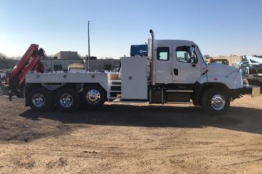 Purpose-built railroad wheel change vehicle