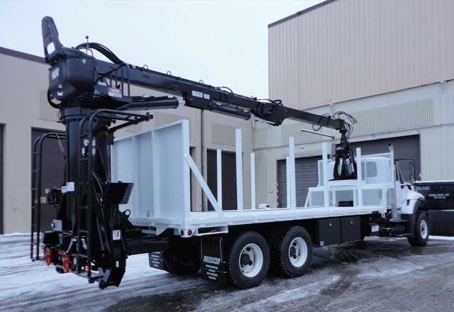 Serco 160 material loader, 16,000 lbs capacity, 29 ft tele-boom with bypass log loader grapple