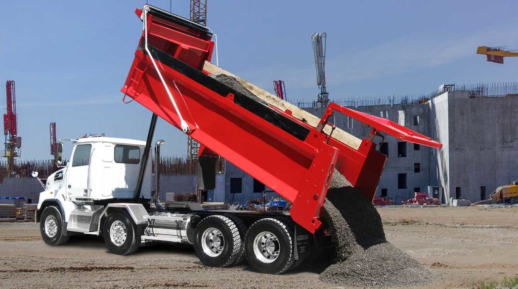 Bibeau BMT series dump body with Hi-Lift gate mounted on twin-steer chassis