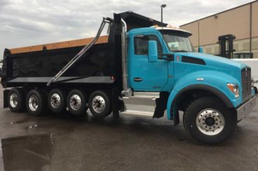 Bibeau BFL 21' Hardox steel dump truck body mounted on quint axle Kenworth chassis