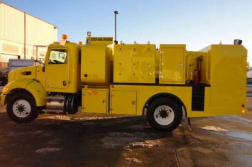 Single axle open body lube truck with 700 gallon diesel fuel tank