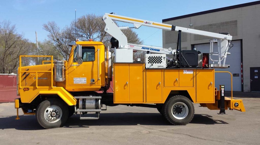 Specially built Tooth Change truck with personnel lift, service crane, dual welders and reels, air compressor and tool storage