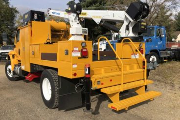 Specially built service truck with dual service cranes, air tools and a custom body