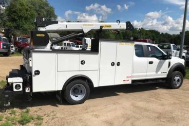 Palfinger PAL Pro model 39 11 ft service body truck upfit with 6,000 lb capacity service crane and workbench bumper