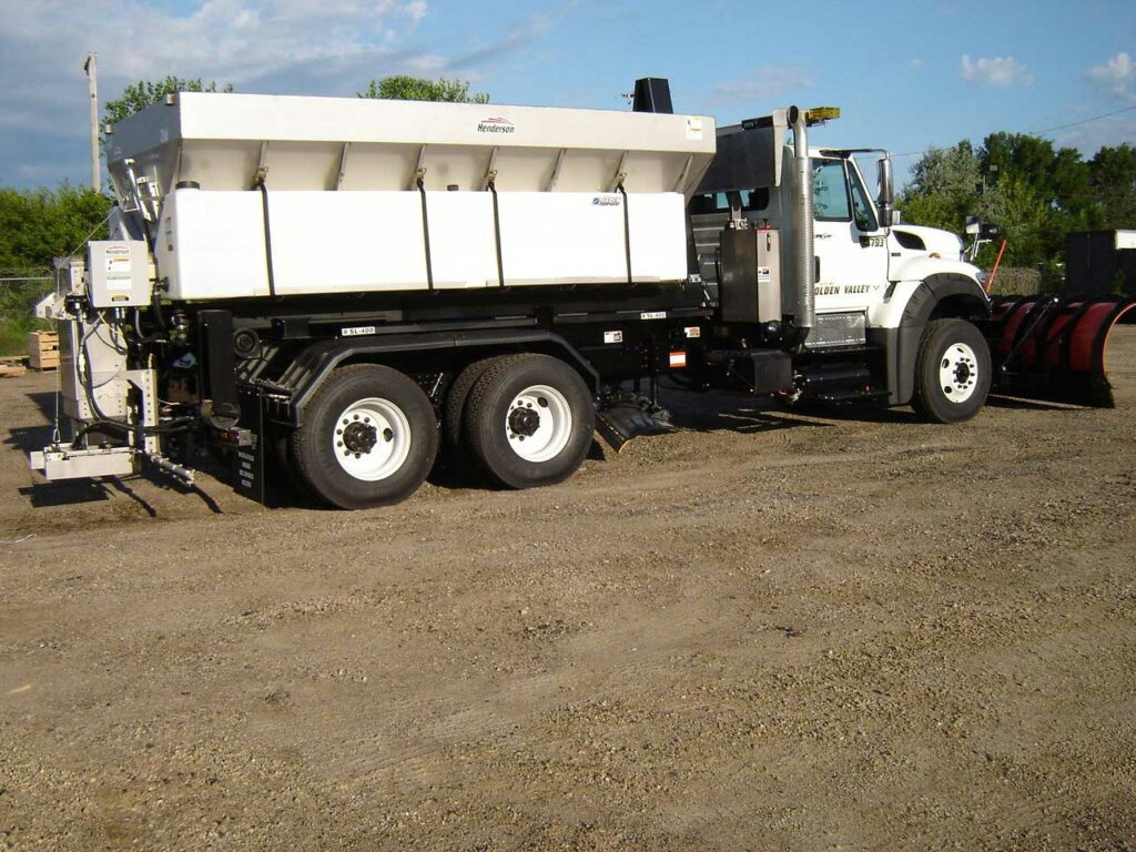 Heavy-duty truck upfit with Henderson dump body and snow plow