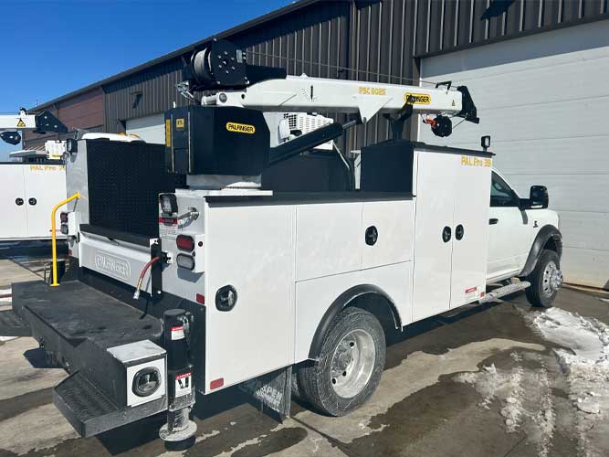 60" H sidepacks with 44" H passenger horizontal and crane compartments Palfinger Pal Pro 39 mechanics body with 6,000 lb capacity, 25 ft reach service crane mounted on Ram 5500 4x4 19,500 lb GVWR truck