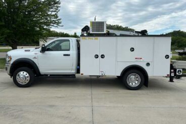 Mechanics truck upfit featuring 2024 RAM 5500 4x4 regular cab and Palfinger 11 ft steel body with 25 ft, 6,000 lb crane capacity, compressor and inverter.