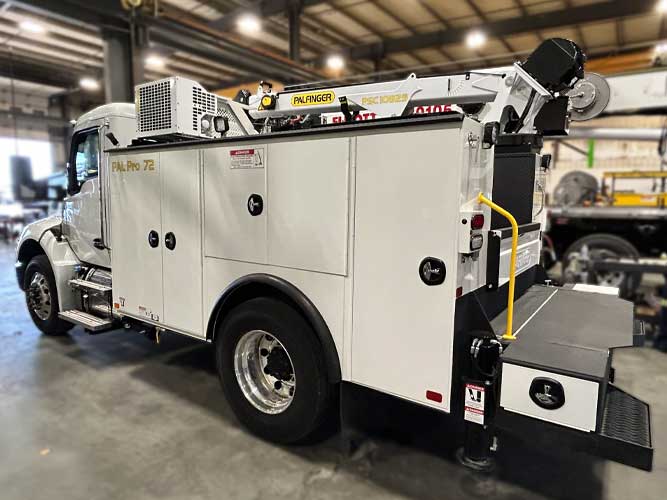 2026 Kenworth T80 mechanics truck with Palfinger service crane and PAL Pro service body parked in an industrial shop